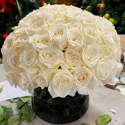 White Is White A Large White Rose Nosegay In A Vase