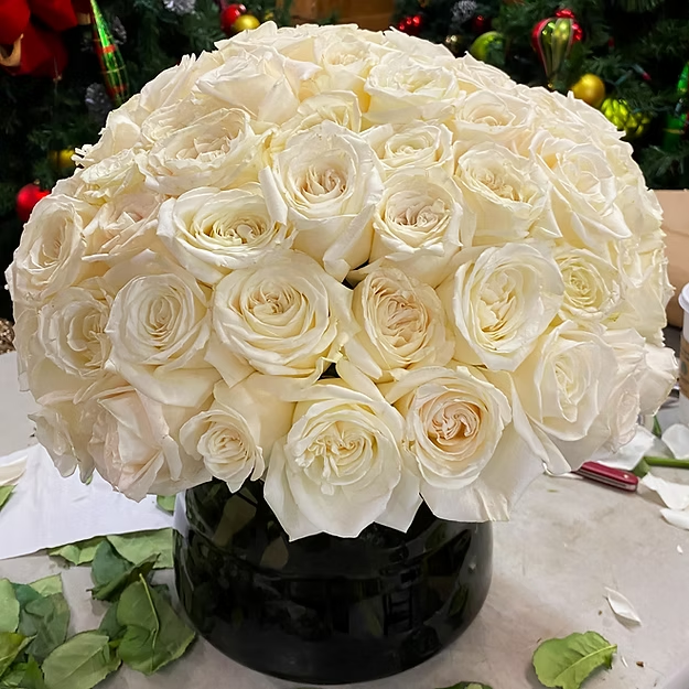 White Is White A Large White Rose Nosegay In A Vase